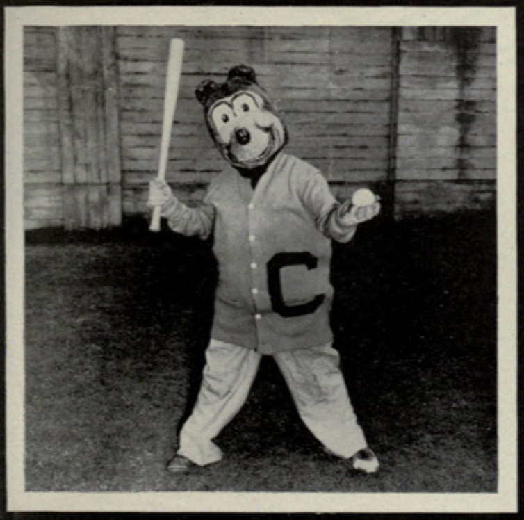 Archival scan: Oski posing with a baseball bat. Photo credit: Photographer/artist uncredited in supplied scan.