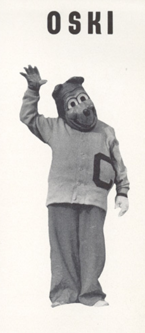 Archival scan: Oski waving in a full-length portrait. Photo credit: Photographer/artist uncredited in supplied scan.