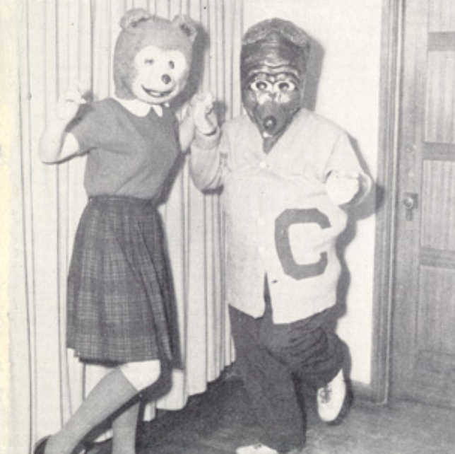 Archival scan: Oski beside a female bear mascot. Photo credit: Photographer/artist uncredited in supplied scan.