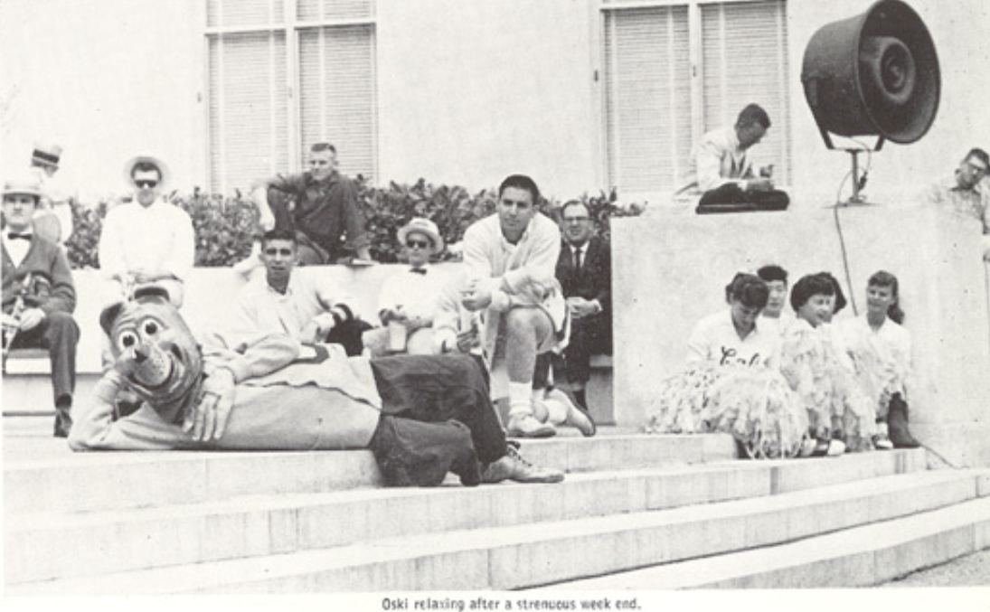 Archival scan: Oski reclining across campus steps. Photo credit: Photographer/artist uncredited in supplied scan.